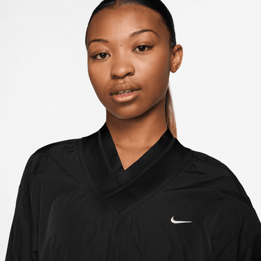 NIKE SPORTSWEAR ESSENTIAL WOMEN 'S LOOSE UV WOVEN LONG-SLEEVE V-NECK TOP