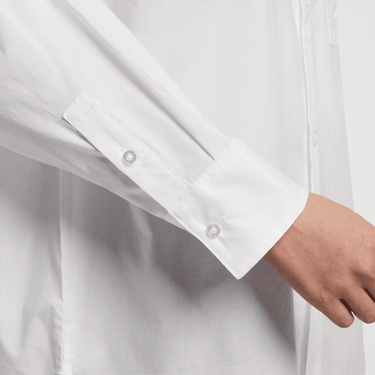 NIKE SPORTSWEAR CHILL POPLIN WOMEN'S LOOSE LONG-SLEEVE BUTTON-UP TOP