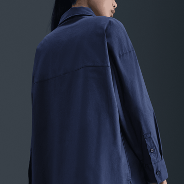 NIKE SPORTSWEAR CHILL POPLIN WOMEN'S LOOSE LONG-SLEEVE BUTTON-UP TOP