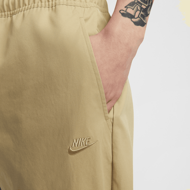 NIKE CLUB MEN'S WOVEN TAPERED PANTS