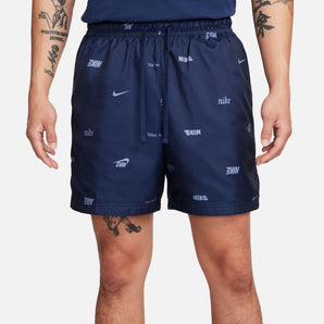 ﻿NIKE CLUB+ ﻿MEN'S WOVEN ALLOVER PRINT FLOW SHORTS
