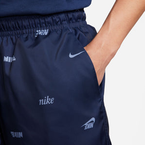 ﻿NIKE CLUB+ ﻿MEN'S WOVEN ALLOVER PRINT FLOW SHORTS