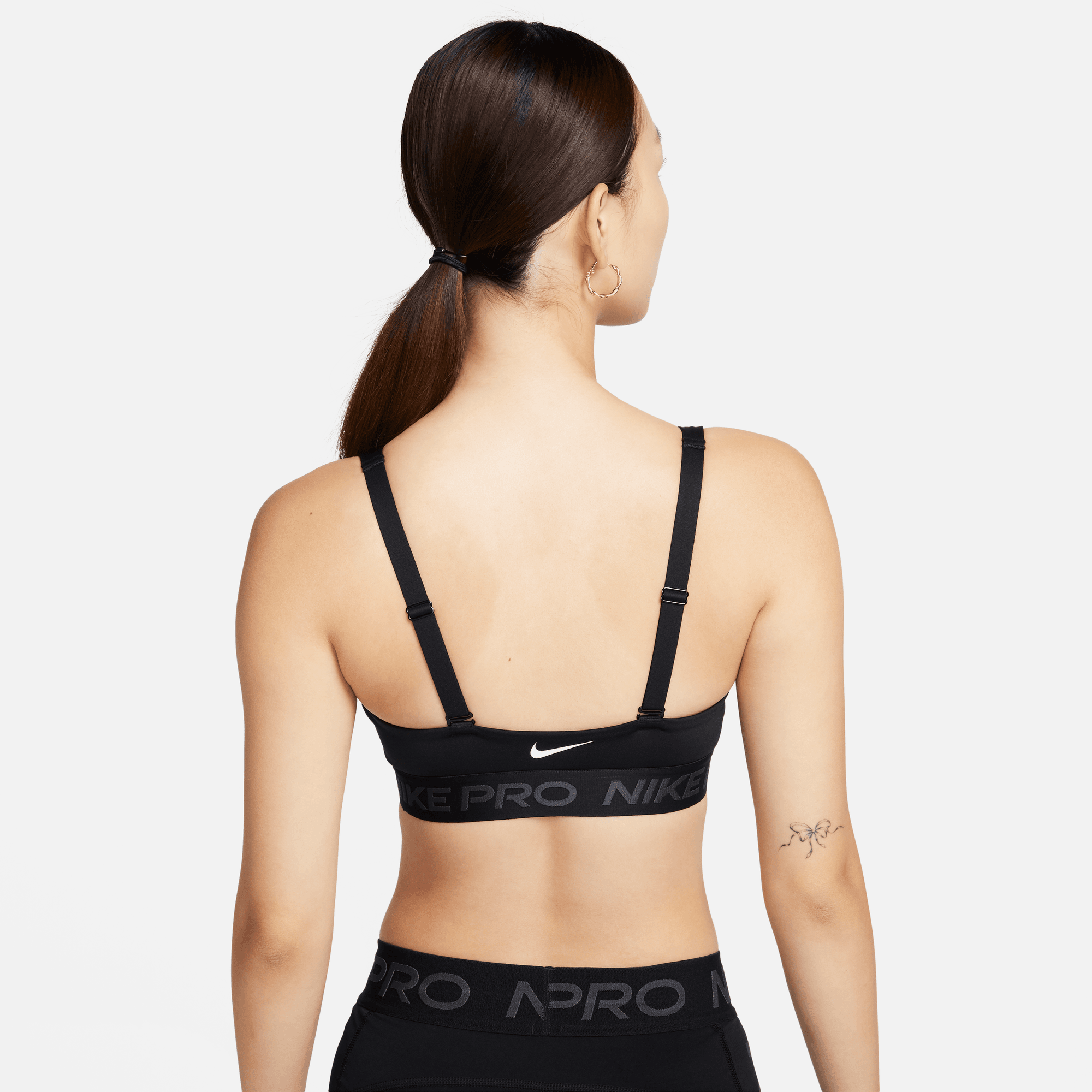 NIKE Indy Sports Bra - Black, White in Bangalore at best price by Nike  Store - Justdial
